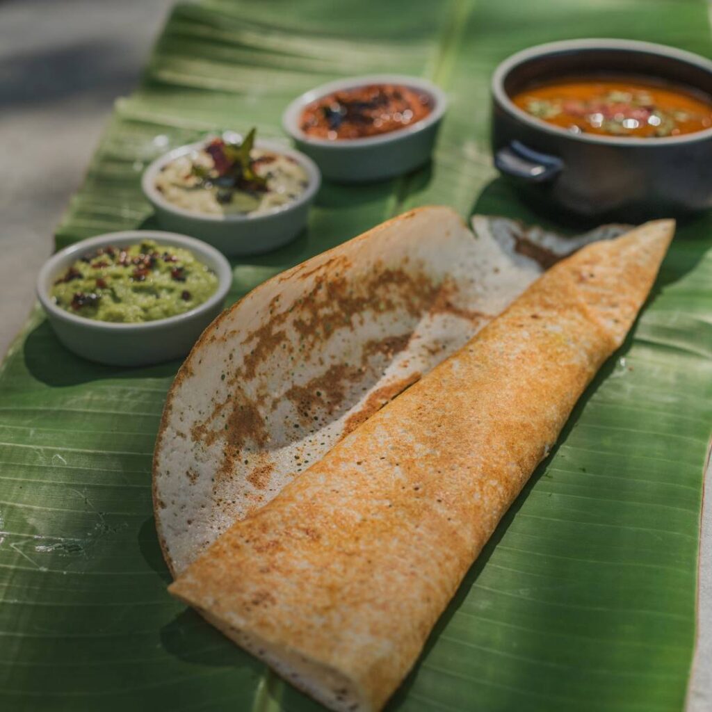 Dosa served with condiments