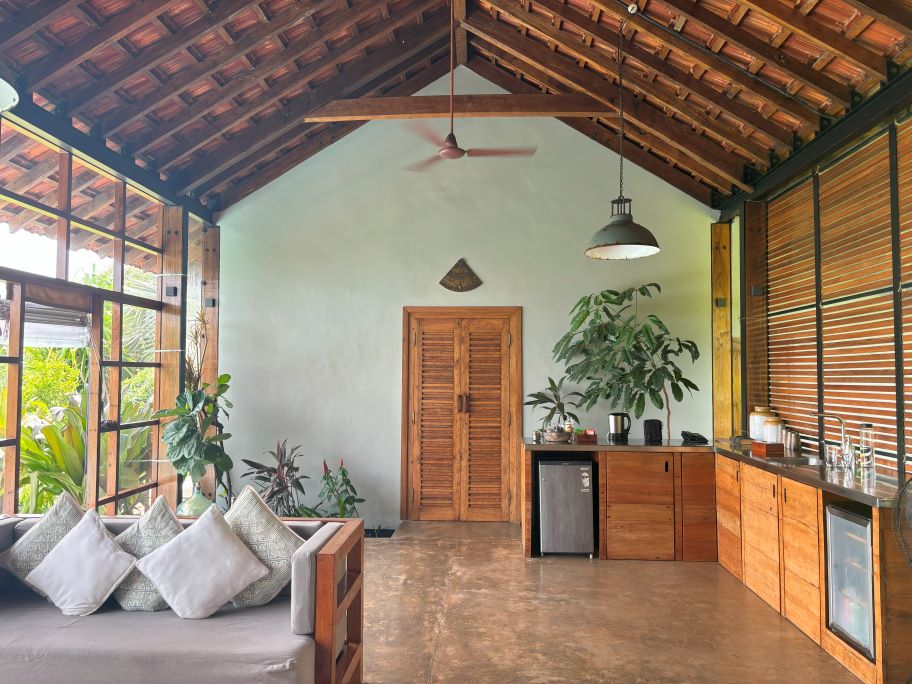 The kitchenette and living area in Coco Shambhala Sindhudurg